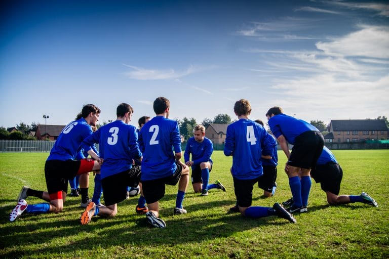 Soccer team kneeling