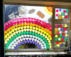 fun coloured window with hearts